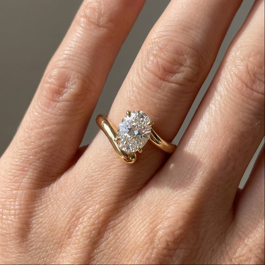 Twist Band Oval Moissanite Ring