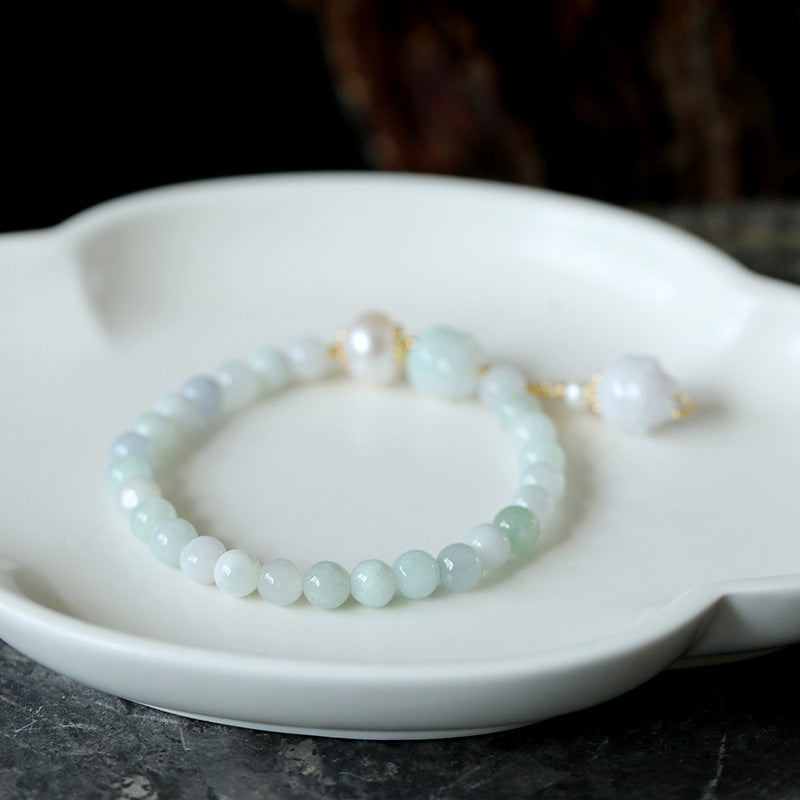 Emerald lotus bracelet