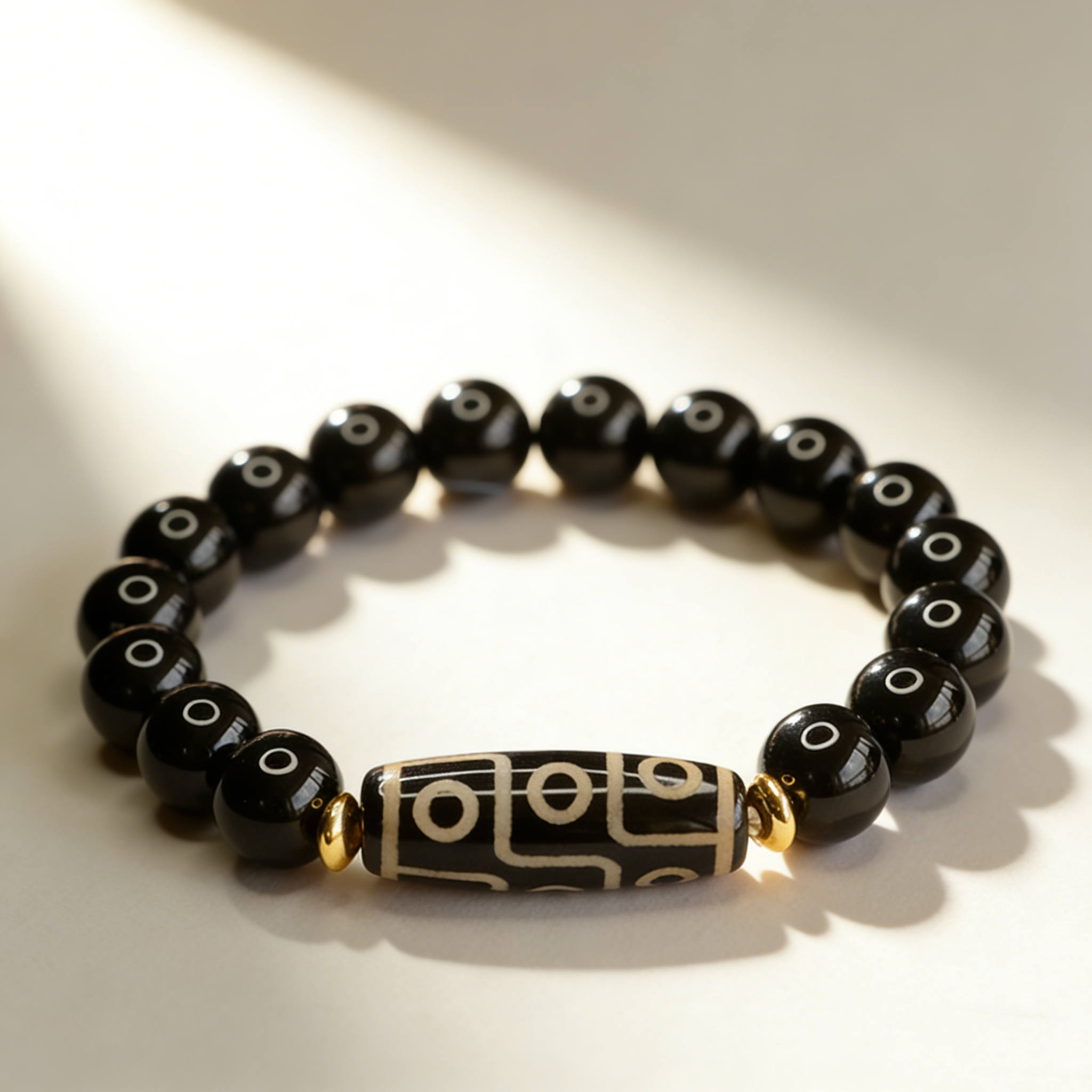 Nine-Eye Dzi Bead Black Agate Bracelet