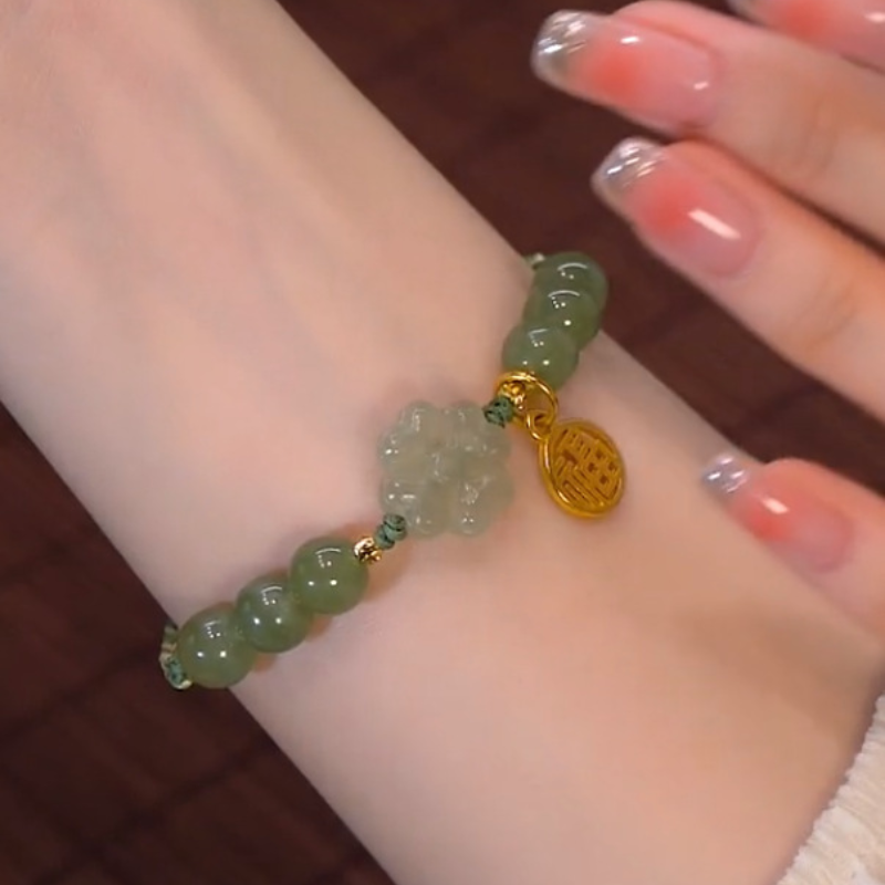 Lucky flower ? Emerald Jade stone braided cord bracelet