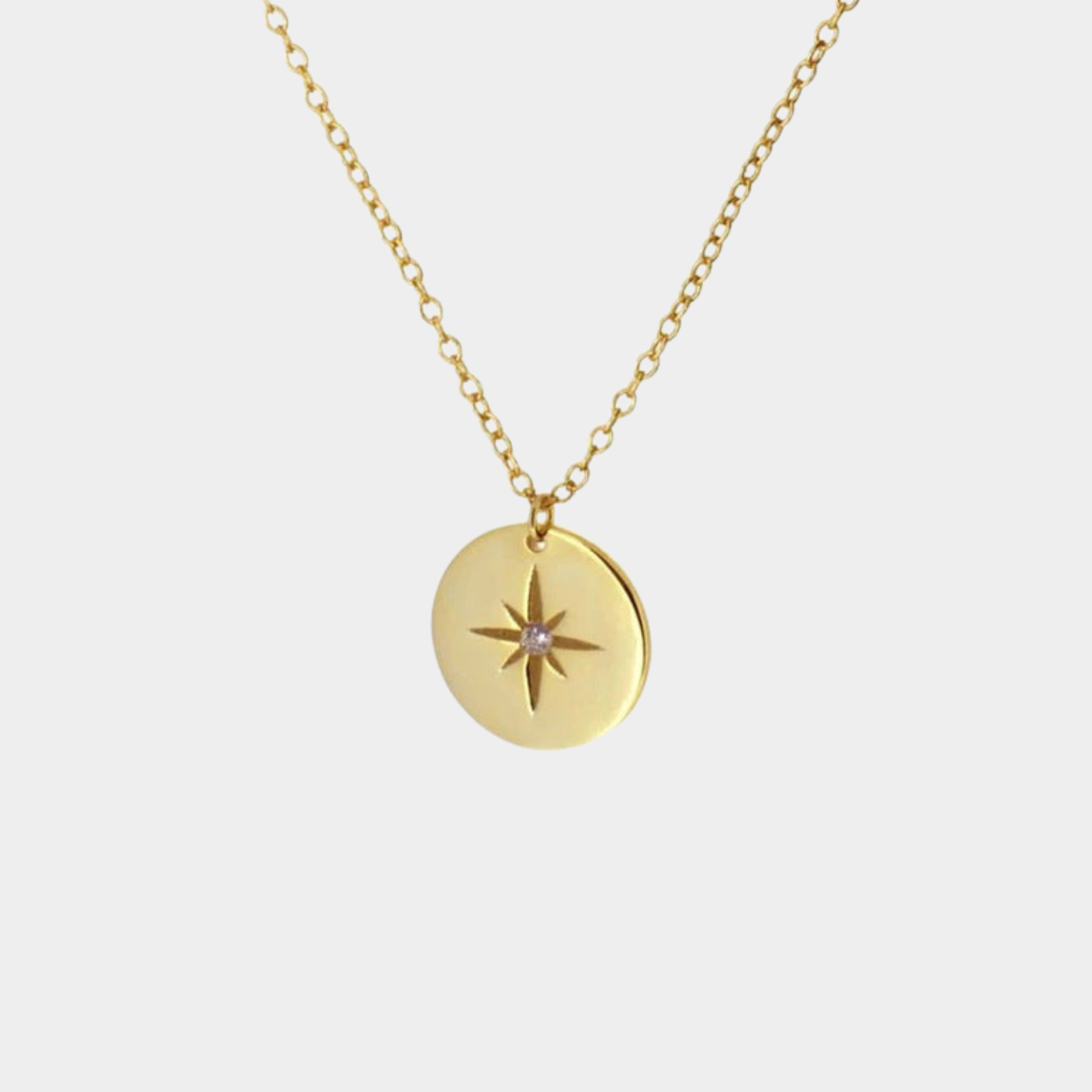 Sophie – A silver necklace with multiple layers and a modest pendant shape.