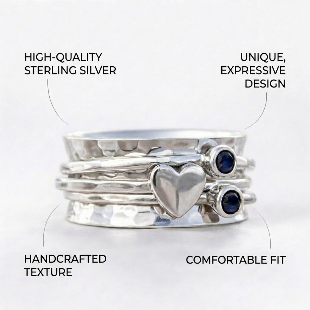 Elegant Rotating Heart Silver Ring