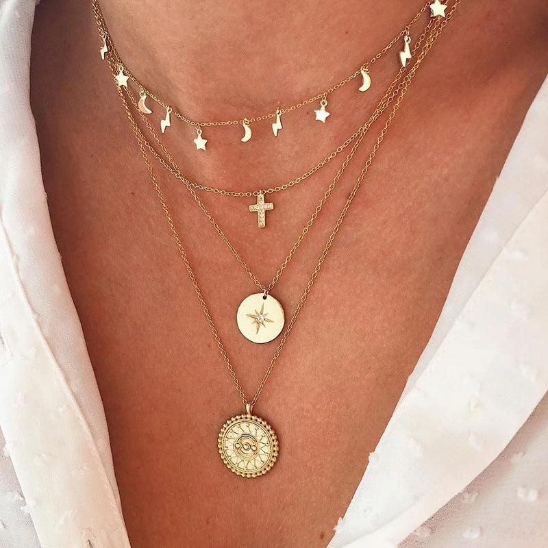 Sophie – A silver necklace with multiple layers and a modest pendant shape.
