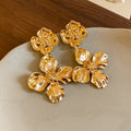 Gold flower earrings