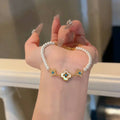 Clover Whisper �?Pearl Bracelet