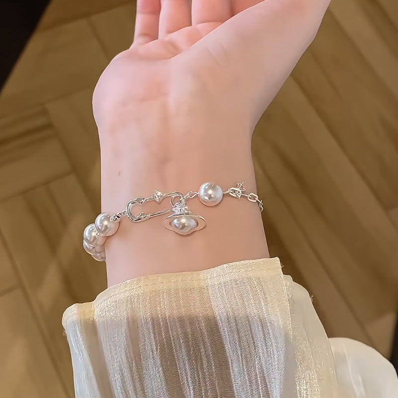 Saturn Orbits �?Pearl Bracelet