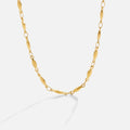 Magdalena – A delicate gold necklace with subtle links.