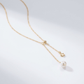 GOLD PEARL STAR LARIAT NECKLACE