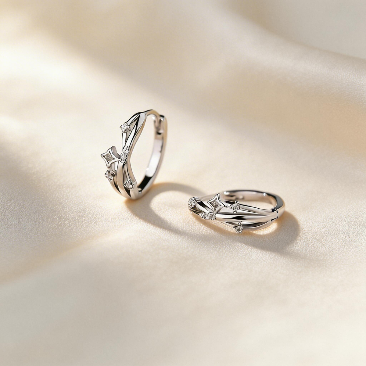 Silver Starburst Twisted Hoop Earrings