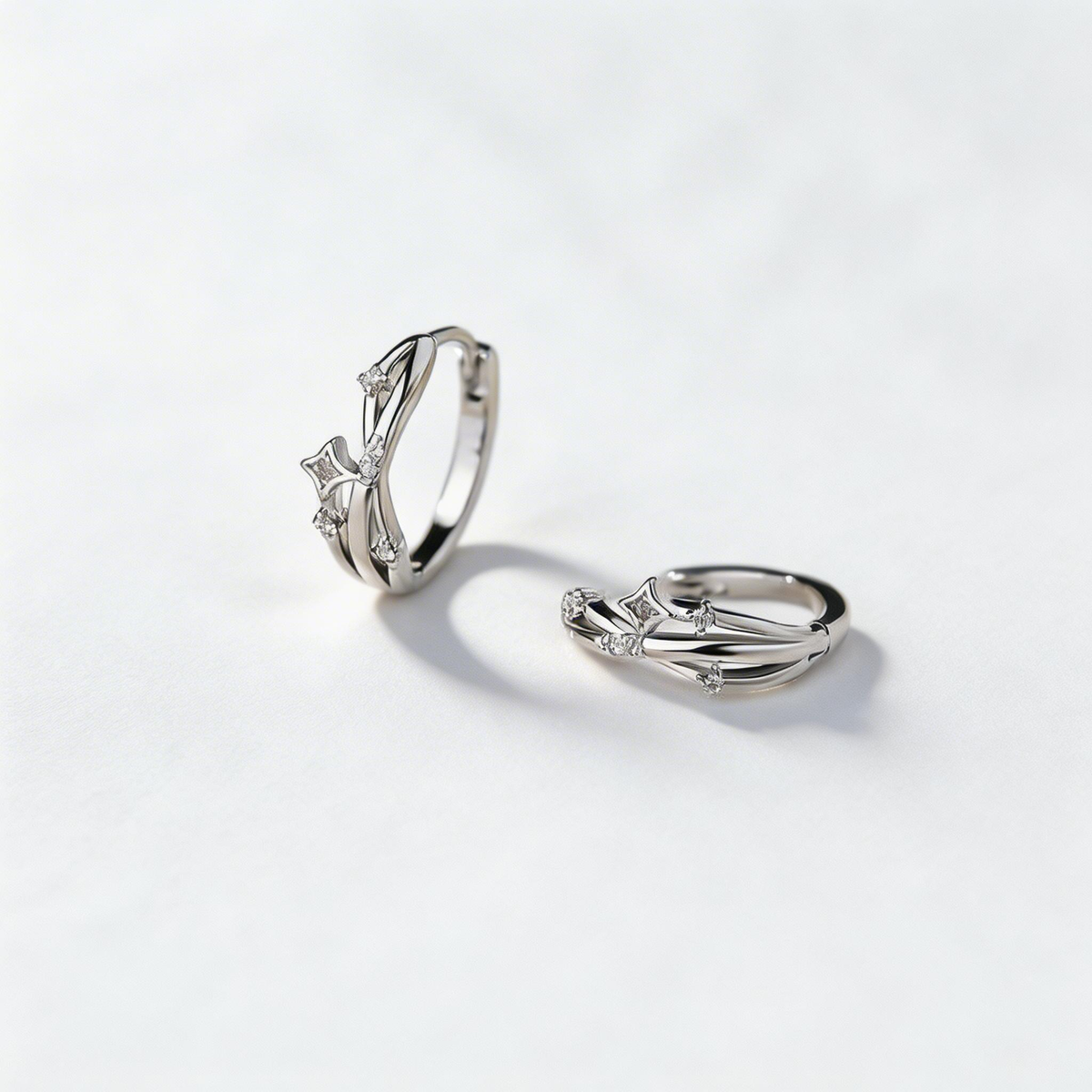 Silver Starburst Twisted Hoop Earrings