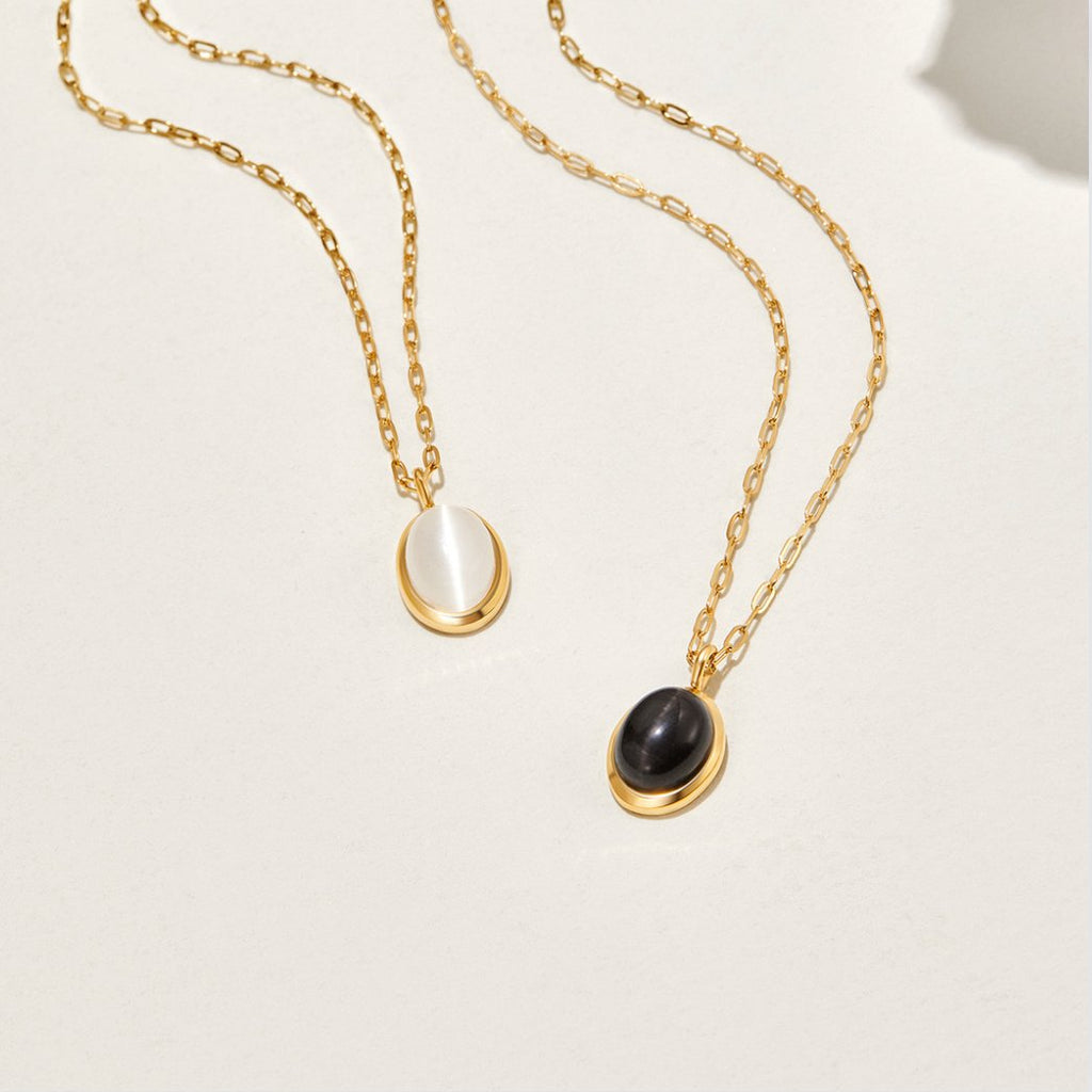 Veronica – Double Gold Necklace with Black Accents.