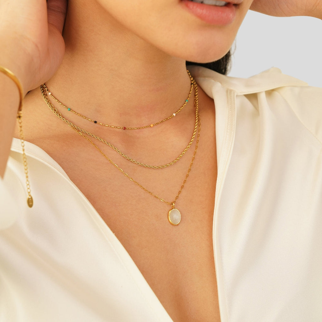 Veronica – Double Gold Necklace with Black Accents.